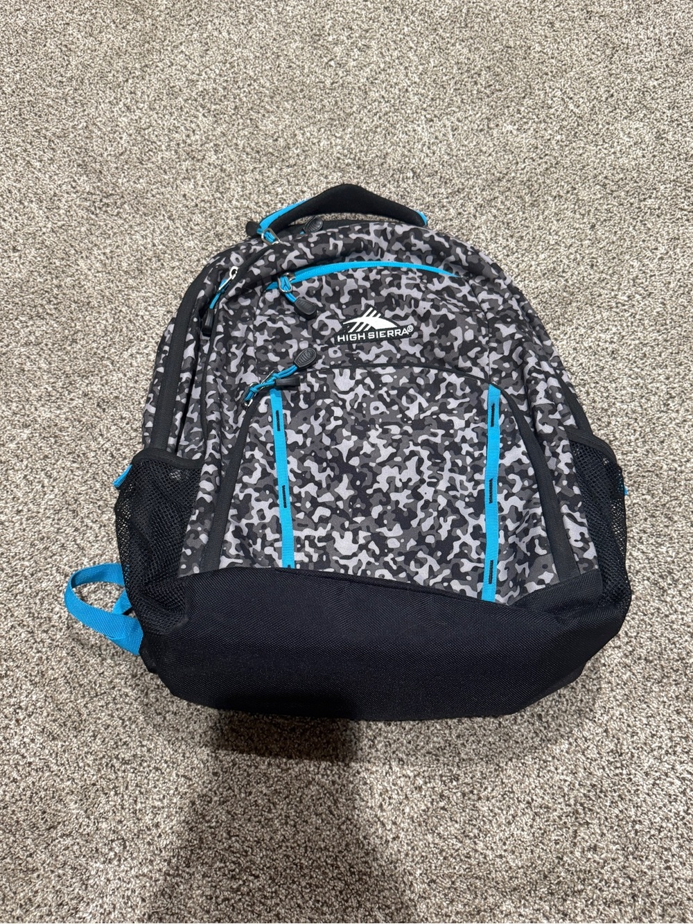 High Sierra Grey Camo Backpack with Bright Blue Accents